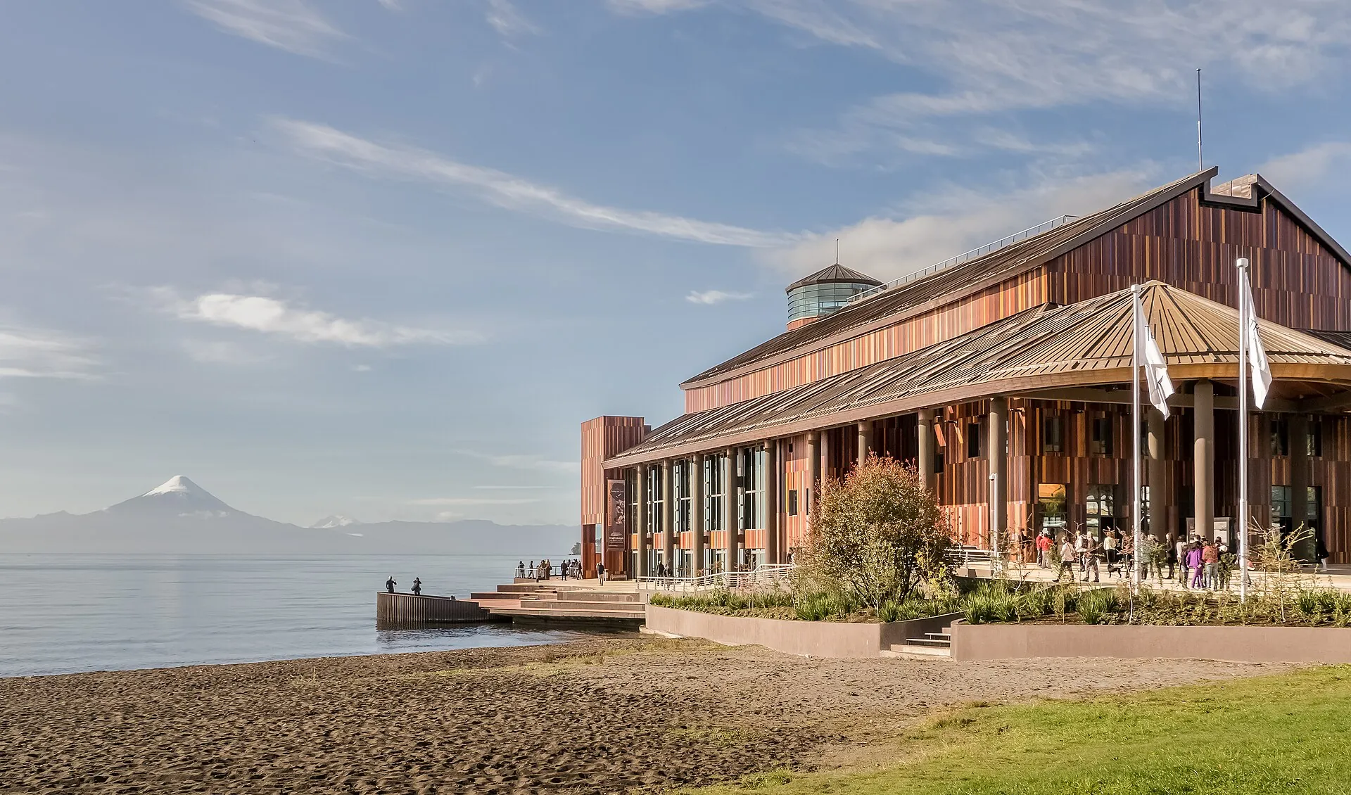 The wooden Teatro del Lago in Frutillar on the shore of Lake Llanquihue, Osorno on the horizon